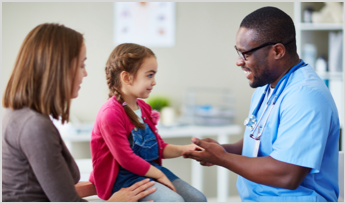 a doctor examine a little girl while her mother looks on